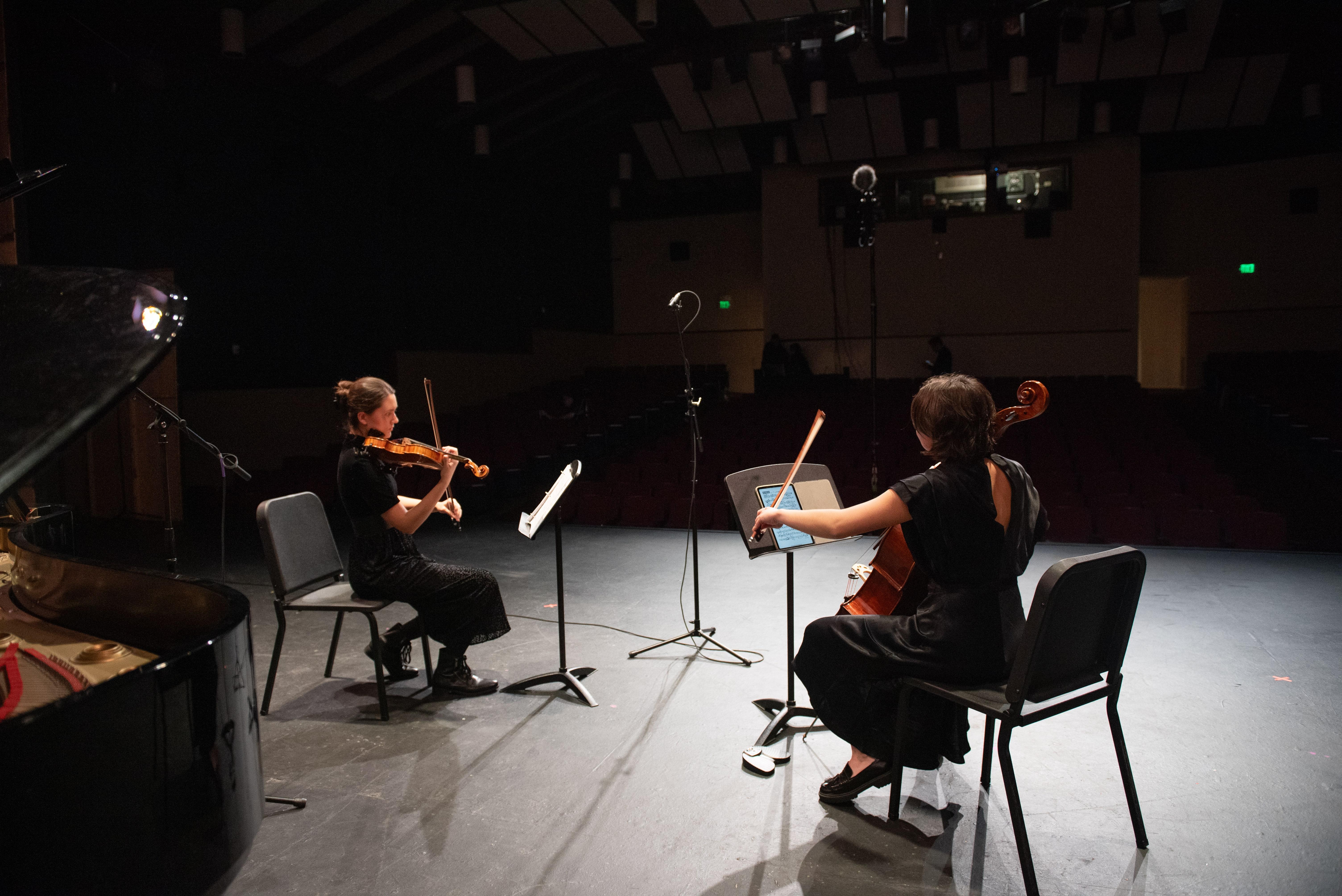 Two musicians performing on the stage at LeFevre theatre