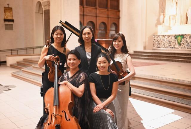 Ensemble Ari members (5 women) in the SMC Chapel holding chamber instruments