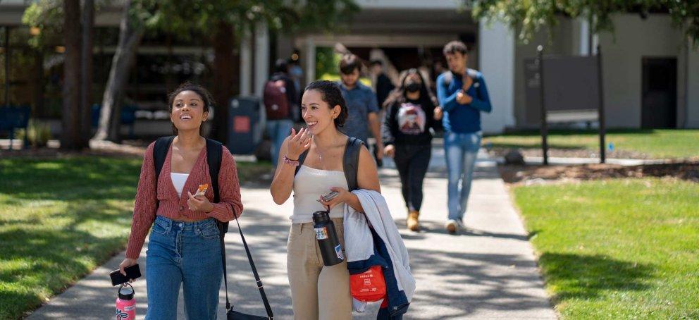 Students walking on Saint Mary's College campus talking